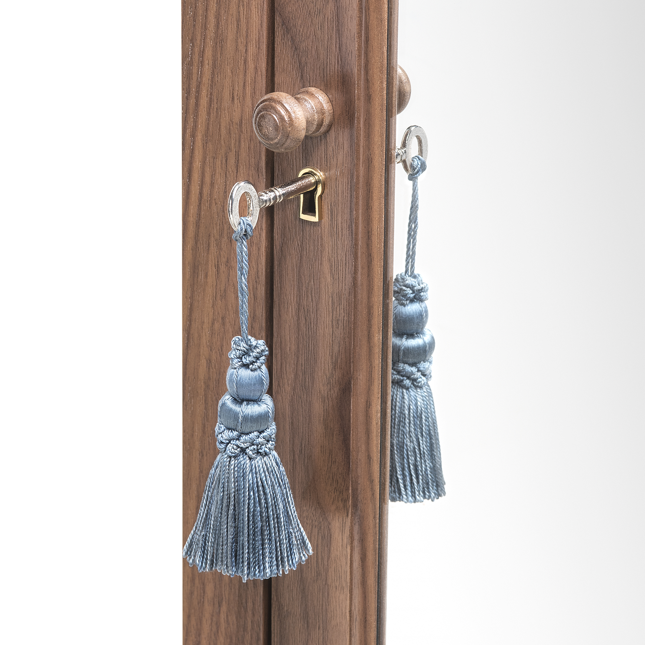 Maria Medicine Cabinet – Key with tassel on walnut cabinet – Ättlingar